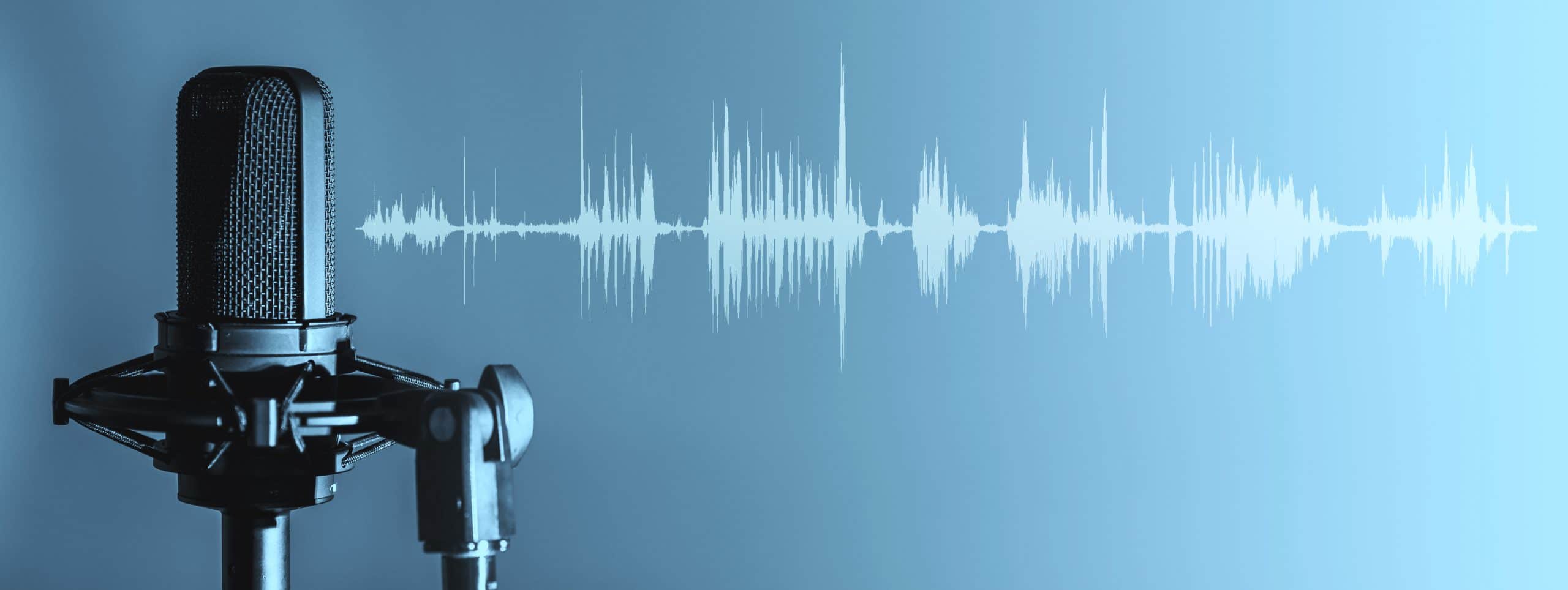 Microphone with waveform on blue background, broadcasting or podcasting banner